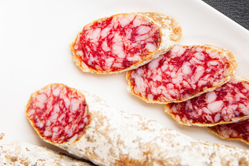 Dry-cured sausage pork meat smoked food fresh delicious gourmet food background on the table rustic...