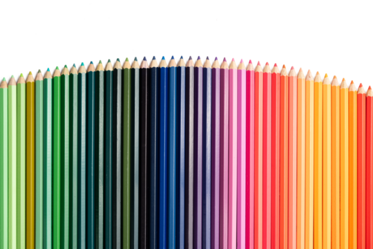 The Photo of colorful colored pencils arranged in a curved line pattern on a white background.