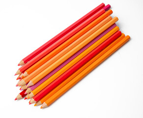 Fototapeta premium The Photo of a stack of colored pencils on a white background.