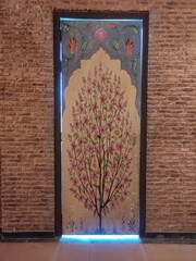 beautiful flower painting on a door with traditional brick wall design background