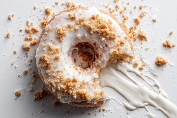 a doughnut being bitten crumbs mid-fall icing stretching from the edge seen from overhead in a white studio. Realistic textures on dough and frosting.