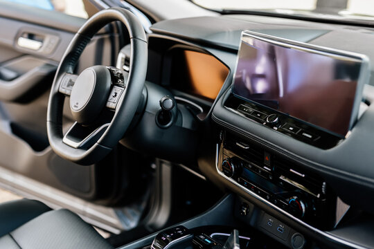 Close-up of the interior of a modern automobile. Interior details. Concept of auto parts, buying auto and interiors. - Powered by Adobe