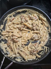 frying pan with pasta