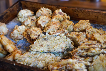 Indonesian Fried Snacks, captured on June 16, 2025. A variety of traditional deep-fried snacks such as tempeh, tofu, and vegetable fritters, commonly enjoyed as street food or side dishes.