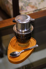Vietnamese Drip Coffee, Indonesia, captured on June 16, 2025. Traditional coffee brewed using a metal drip filter, slowly producing bold and aromatic flavor, served with sweetened condensed milk.