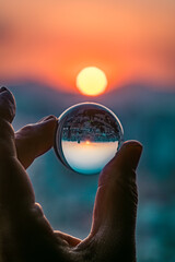 Crystal Ball Sunset Reflection. Inverted Cityscape at Golden Hour