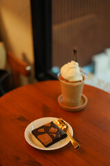 Closeup of Iced Caramel Macchiato at the coffee shop, Caramel Macchiato is a classic macchiato...