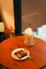 Closeup of Iced Caramel Macchiato at the coffee shop, Caramel Macchiato is a classic macchiato...