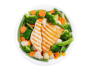 plate of grilled turkey and mix of steamed vegetables isolated on transparent background, top view