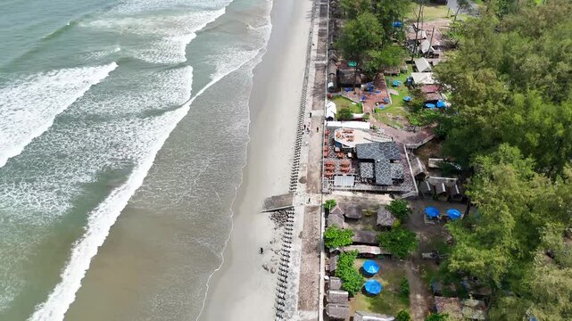 Bengkulu, Indonesia - April 17, 2025: Aerial view drone shot of beautiful tropical Pasir Putih Beach