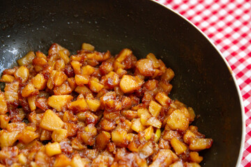 Homemade apple pie filling in a pan