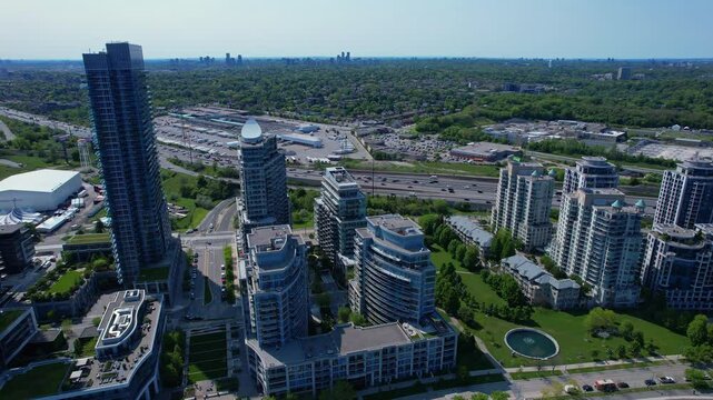 Aerial view of Humber Bay Shores, Etobicoke near Toronto area is chic waterfront gem. Epic cityscape condos buildings, vibrant green park trails near lakefront scenic escapes and modern living. Mimico