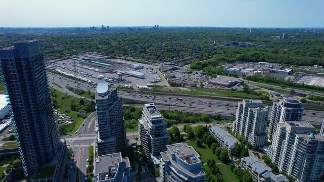 Aerial view of waterscapes condos at Marine Parade Drive near Humber Bay Park and close to the Ontario lakefront in Etobicoke. Mimico scenic waterfront parks for leisure and fishing. Toronto West.