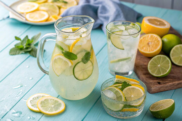 Fototapeta premium Thirst-quenching homemade lemonade with an abundance of citrus fruits, perfect for a hot day.