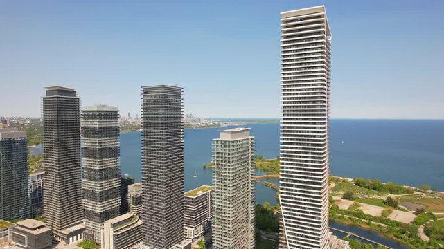 Aerial view of waterscapes condos at Marine Parade Drive near Humber Bay Park and close to the Ontario lakefront in Etobicoke. Mimico scenic waterfront parks for leisure and fishing. Toronto West.