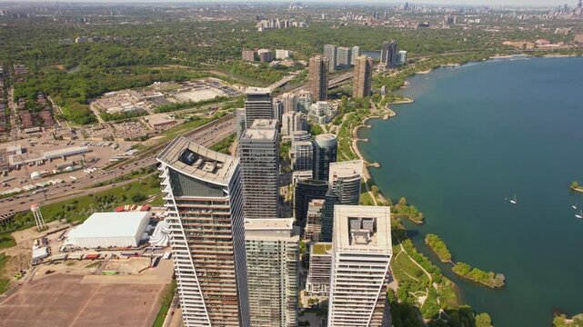 Aerial view of waterscapes condos at Marine Parade Drive near Humber Bay Park and close to the Ontario lakefront in Etobicoke. Mimico scenic waterfront parks for leisure and fishing. Toronto West.