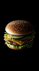 Juicy Cheeseburger with Sesame Seed Bun on Black Background