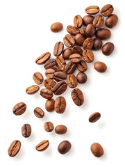 Naklejka premium Scattered roasted coffee beans on a white background showing varied shades of brown and bean textures