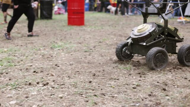 Self-propelled drone on wheels carries anti-tank mine
