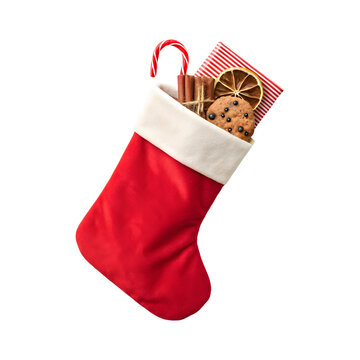 Christmas stocking stuffed with present box, cinnamon sticks and a cookie, isolated on a transparent background