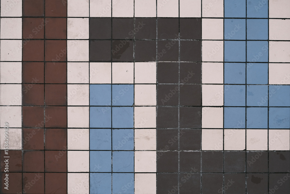 Poster a tiled wall with a pattern of squares and rectangles