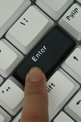 The black enter key on a mechanical keyboard with a monochrome theme