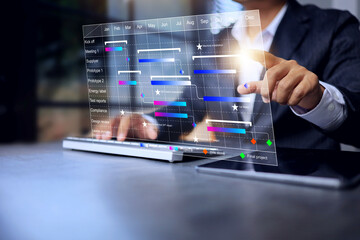 Project management concept with businessman manage work schedule on gantt chart to planning project...