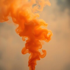 Swirling orange smoke against a neutral background captured in a closeup view