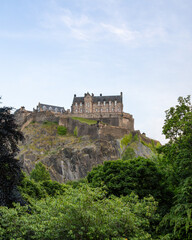 Edinburgh Castle Scotland - Princes Gardens Spring atmosphere on a cloudy day.