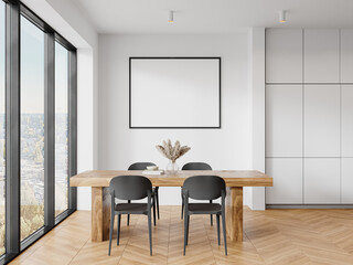 Vertical frame mockup on kitchen wall with dining table and island – side perspective
