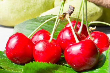 Red early cherries close-up. Vitamins and healthy nutrition