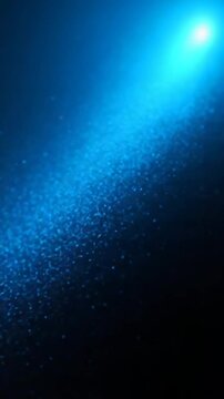 Blue particles increasing speed with a blue light