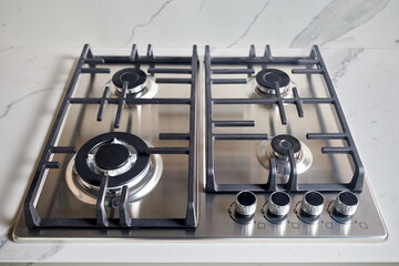 Modern hob gas or gas stove made of stainless steel using natural gas or propane for cooking...