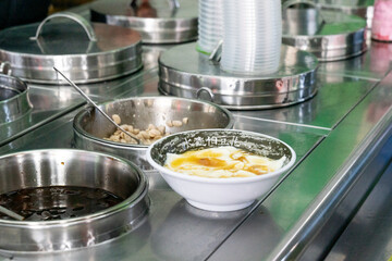 A delicious bowl of soft tofu pudding, known as 