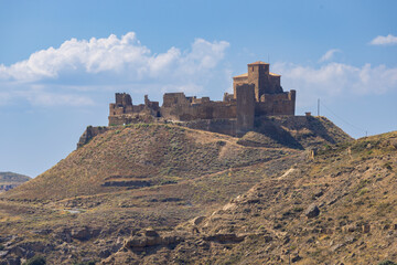 Castillo de Montearagon standing on a hill in Quicena, Spain