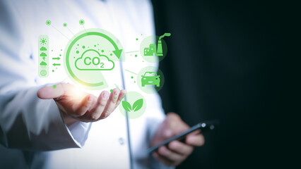 Businessman hand holding earth and icon, save planet, earth day, sustainable living, ecology environment, climate emergency action, world environment day concept, global warming content.