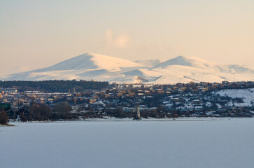 Hrazdan reservoir and snow-covered mountains of Gegham ridge scenic view (Kotayk province, Armenia)