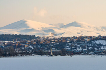 scenic view of Hrazdan reservoir and snow-covered Menaksar mountain (Kotayk province, Armenia)
