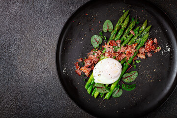 asparagus with poached egg and fried bacon, micro greens and spices, breakfast, homemade, no people,