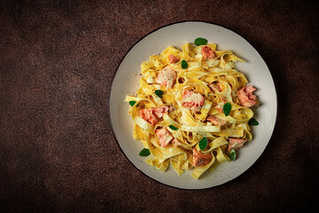 tagliatelle pasta, in cream sauce with salmon, homemade, no people,