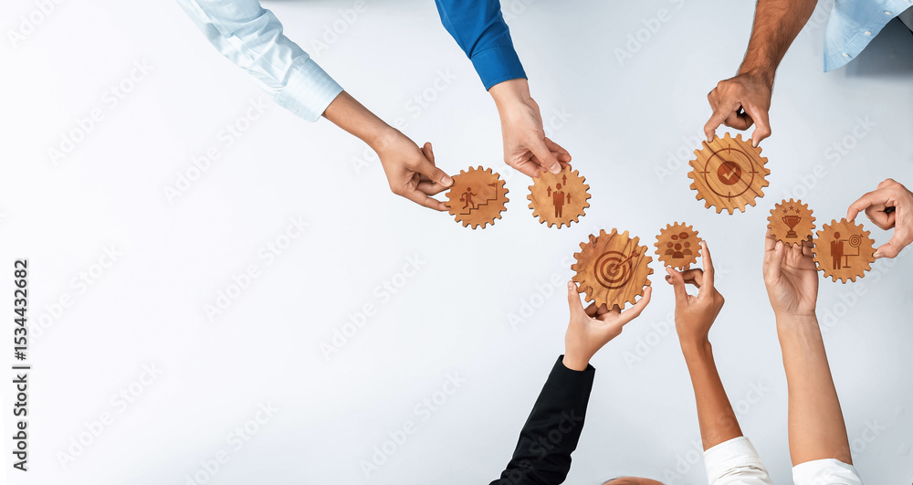 Poster This image captures the essence of teamwork and collaboration as diverse hands join together to hold wooden gears, symbolizing unity and innovative strategies in a business context. Amity