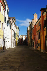 Old canals and streets in Chioggia, Italy