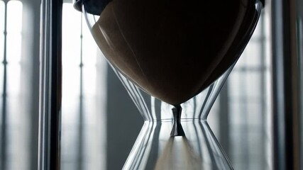 Hourglass sand flowing time - Powered by Adobe