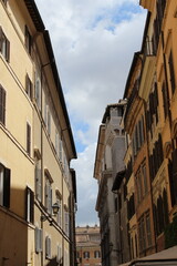 Obraz premium Italian street in Rome. Italian architecture buildings in Rome. Italian architecture buildings and houses background wallpaper 
