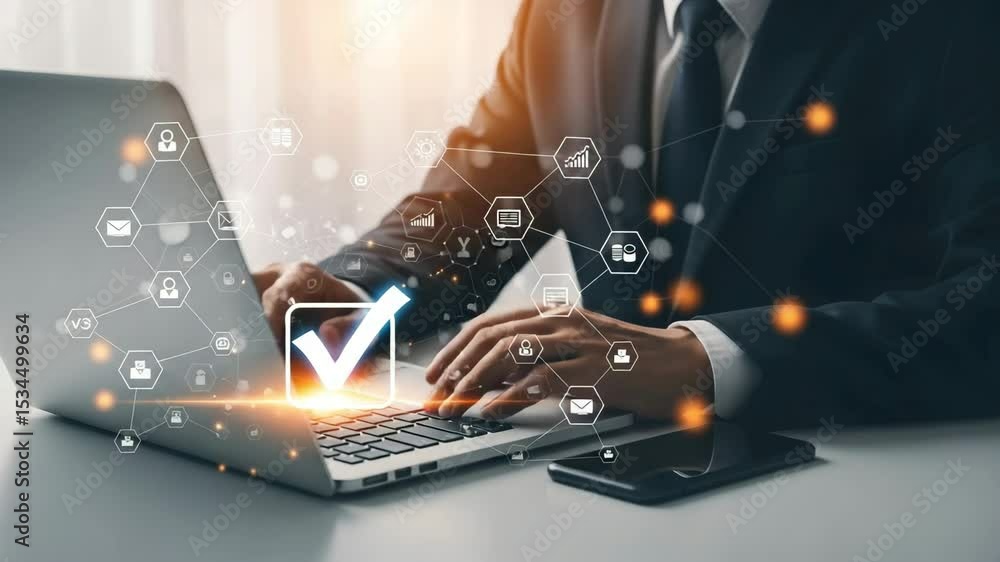 Poster Man in suit using laptop with digital network overlay and checkmark on keyboard button glow effect