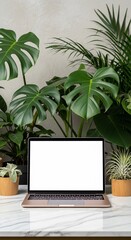 Laptop with Blank Screen Surrounded by Lush Greenery and Plants in Bright Light