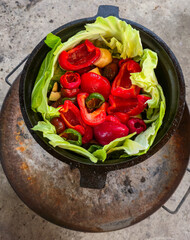 Preparing a dish in a cauldron - step by step.