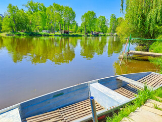 Beautiful views of the river Berounka a Wooden boats in the spring season. Czech