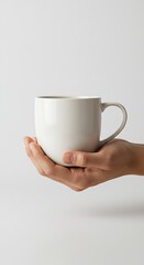 Obraz premium Portable mug mockup with clean white ceramic surface and white background for branding and coffee product presentation