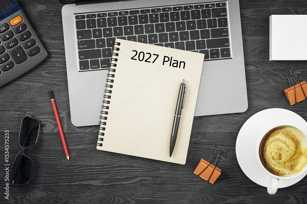 Aufkleber Top view of a desk setup with 2027 plan notebook, laptop, coffee cup, accessories and clean workspace layout on dark background.. 3D Rendering